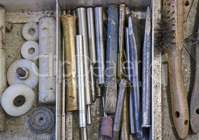 tools in drawer - chisel, punch, steel brush