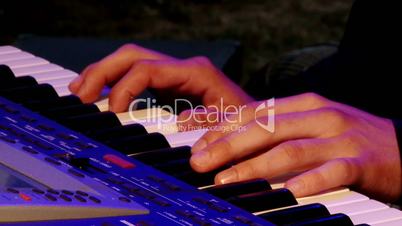 Man play music keyboard, colorful