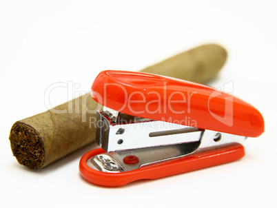 Red stapler and cigar