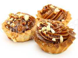 Pie a basket with chocolate condensed milk and nuts