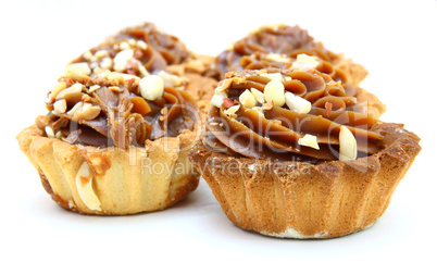 Pie a basket with chocolate condensed milk and nuts