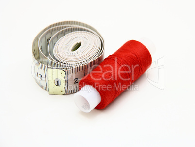 The coil of a red thread with centimeter