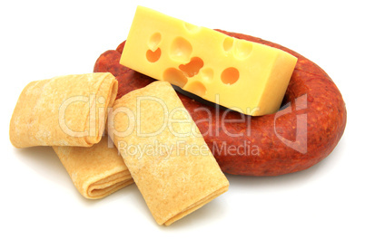 Rolled pancakes with cheese and sausage