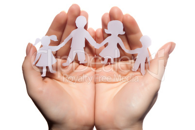 Paper chain family protected in cupped hands