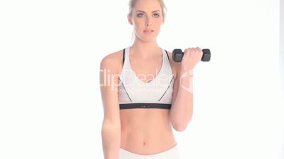 blonde fitness woman lifting weights