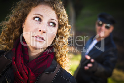 Pretty Young Teen Girl with Man Lurking Behind Her