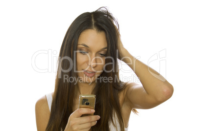 Woman reading message on mobile phone