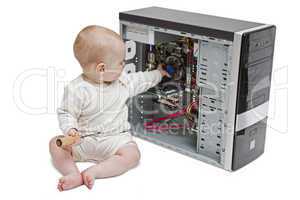 young child working on open computer
