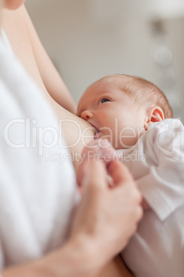 Newborn getting lactated