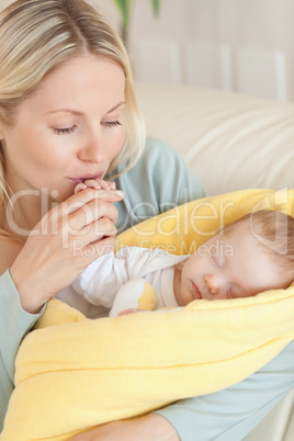 Close up of mother enjoys being with her baby