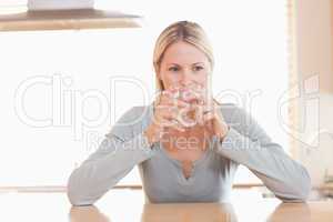 Woman having a sip of water