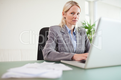 Businesswoman working on her laptop