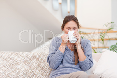 Woman having a cup of coffee