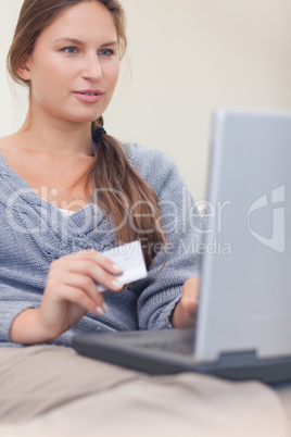 Portrait of a woman booking her holidays online