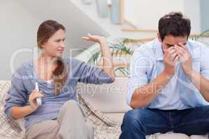 Man being tired of arguing with his wife