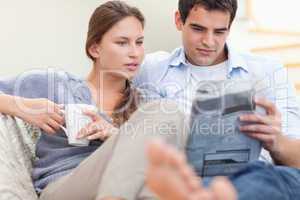 Couple reading the news