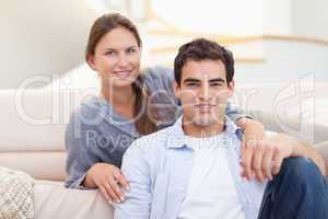 Couple sitting in their living room