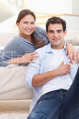 Delighted couple hugging