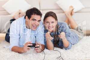 In love couple playing video games