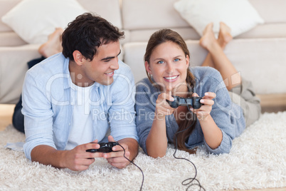 Lovely couple playing video games