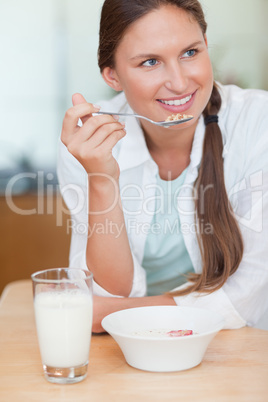 Portrait of a woman having breakfast