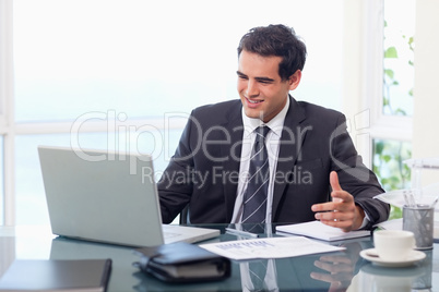 Upset businessman during a video conference