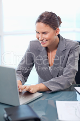 Portrait of a businesswoman working with a laptop