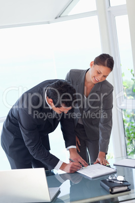 Business partners signing contract