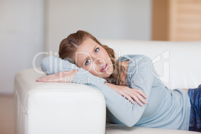 Young woman relaxing on the sofa