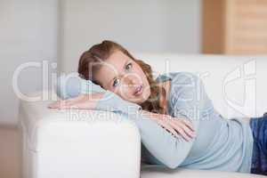 Young woman relaxing on the sofa