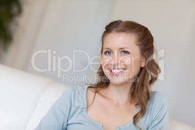 Smiling woman in her living room