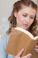 Close up of woman reading a book