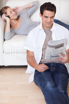 Couple enjoying their spare time in the living room