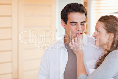 Woman feeding her boyfriend
