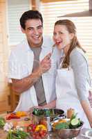 Couple enjoys preparing lunch together