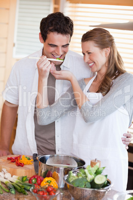 Couple having fun cooking together