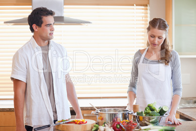 Couple having a tensed situation in the kitchen