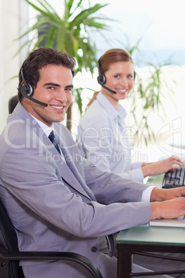 Side view of call center agents