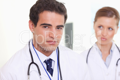 Assistant doctors standing next to each other