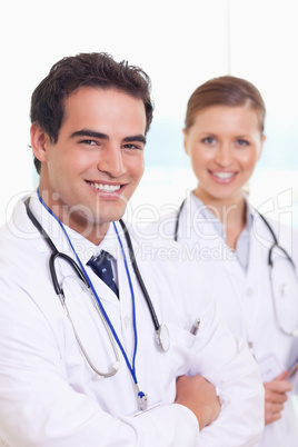 Smiling medical team standing next to each other