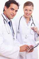 Assistant doctors with tablet