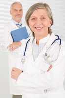 Medical doctor team seniors smiling hold folders