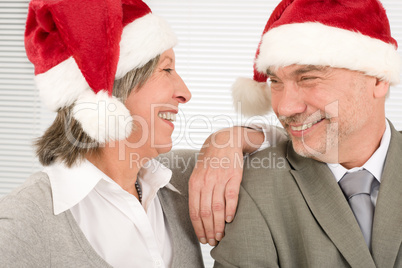 Christmas hat senior businesspeople fun laughing