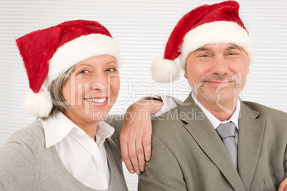 Christmas hat senior businesspeople fun laughing