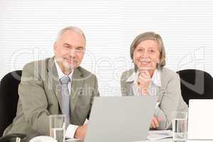 Senior businesspeople working computer in office