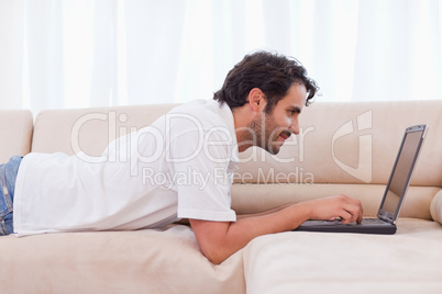 Handsome man using a laptop Handsome man using a laptop