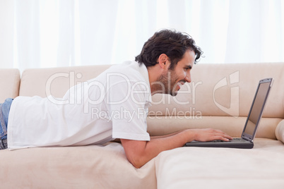 Handsome man using a notebook Handsome man using a notebook