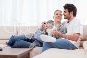 Young couple having a cup of coffee