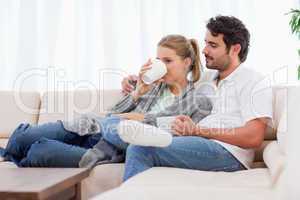 Young couple having a cup of tea