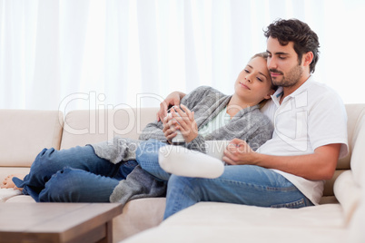 Lovely couple having a cup of coffee